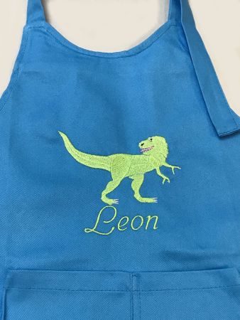 Kinderlatzschürze blau mit Tyrannusaurus Rex & Namen